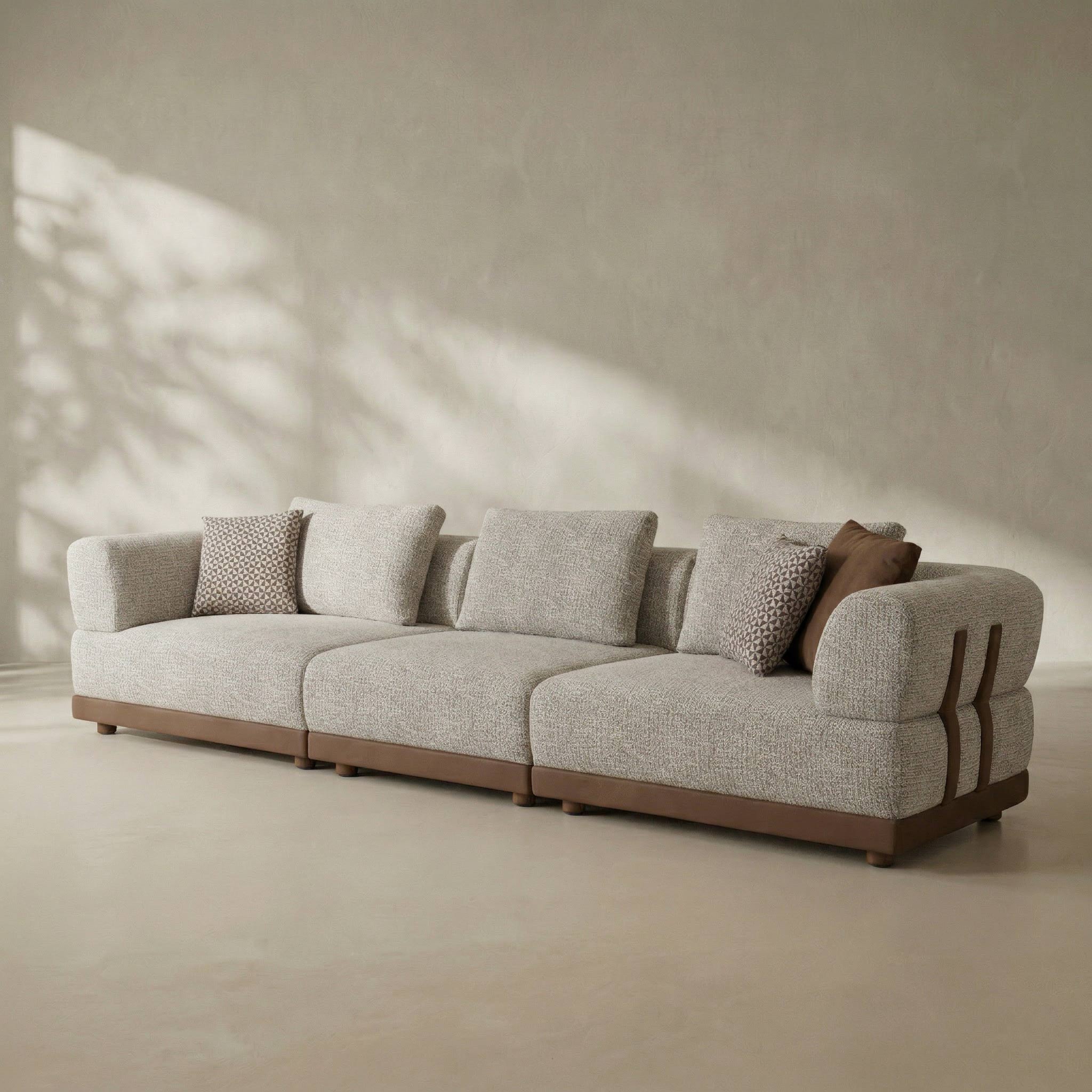 Gray sofa with brown accents in a minimalistic room