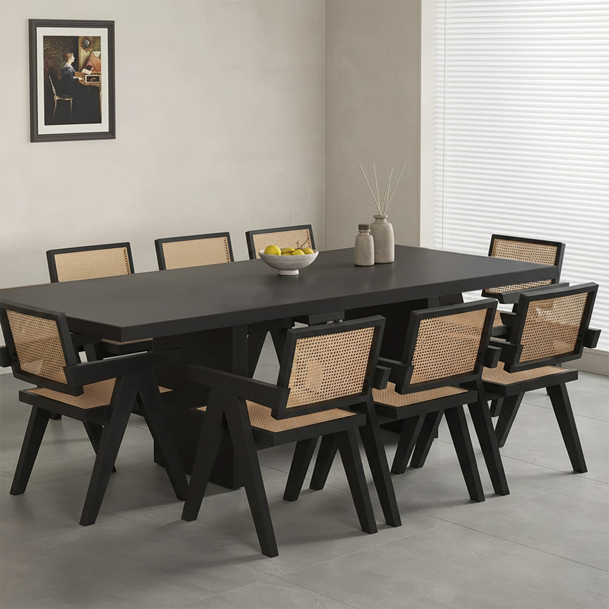 Full view of large black 8-seater dining table complemented by sophisticated cane chairs, ideal for expansive dining areas.