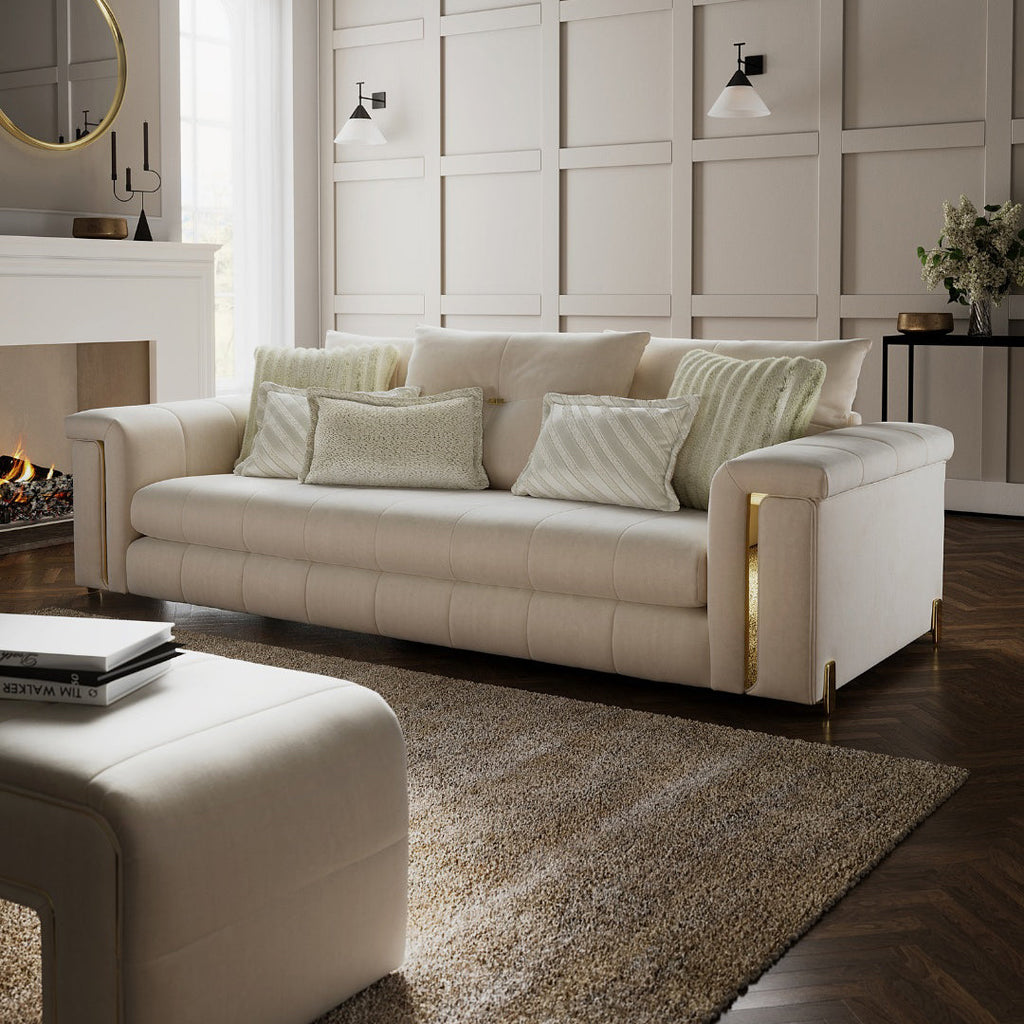 Alcotta 3-seater cream sofa on white background featuring plush back cushions and modern tufted seat design.
