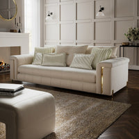 Alcotta 3-seater cream sofa on white background featuring plush back cushions and modern tufted seat design.