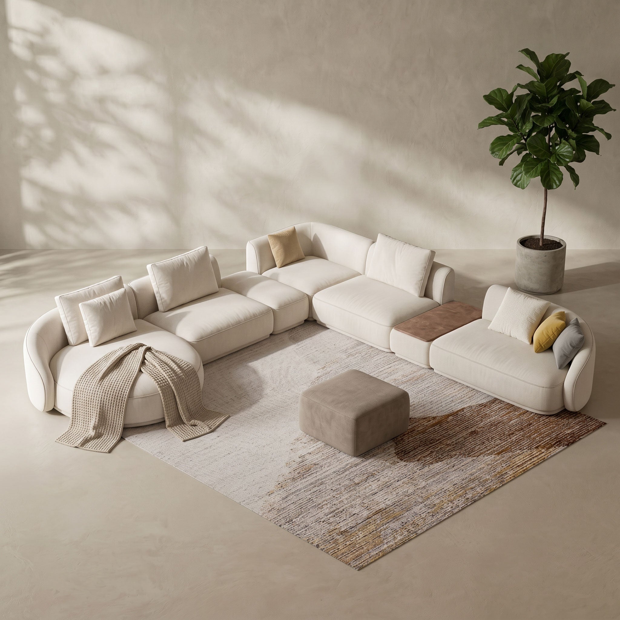 Modern beige sectional sofa in a minimalistic living room with a plant and rug.