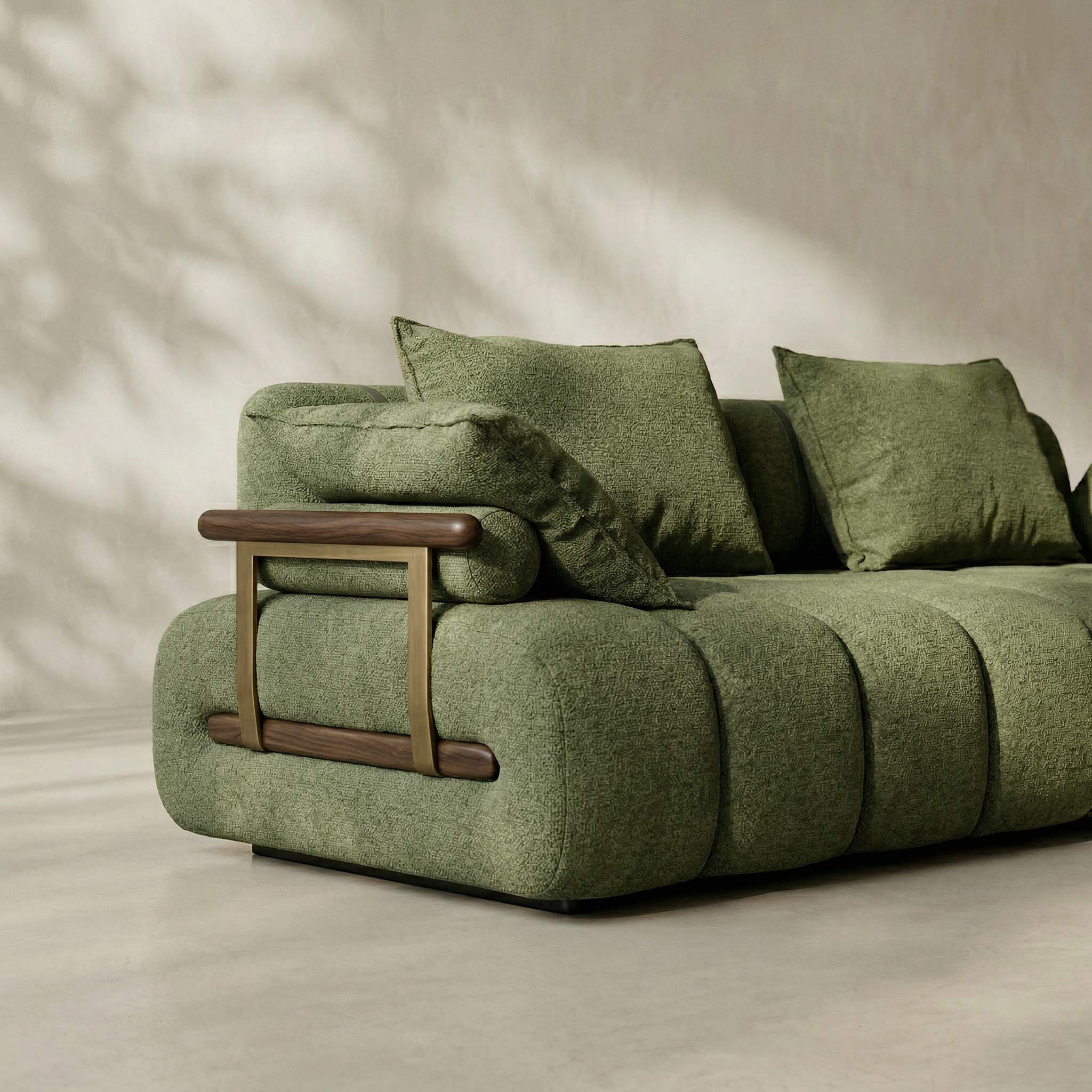 Green sofa with wooden armrest on a neutral background