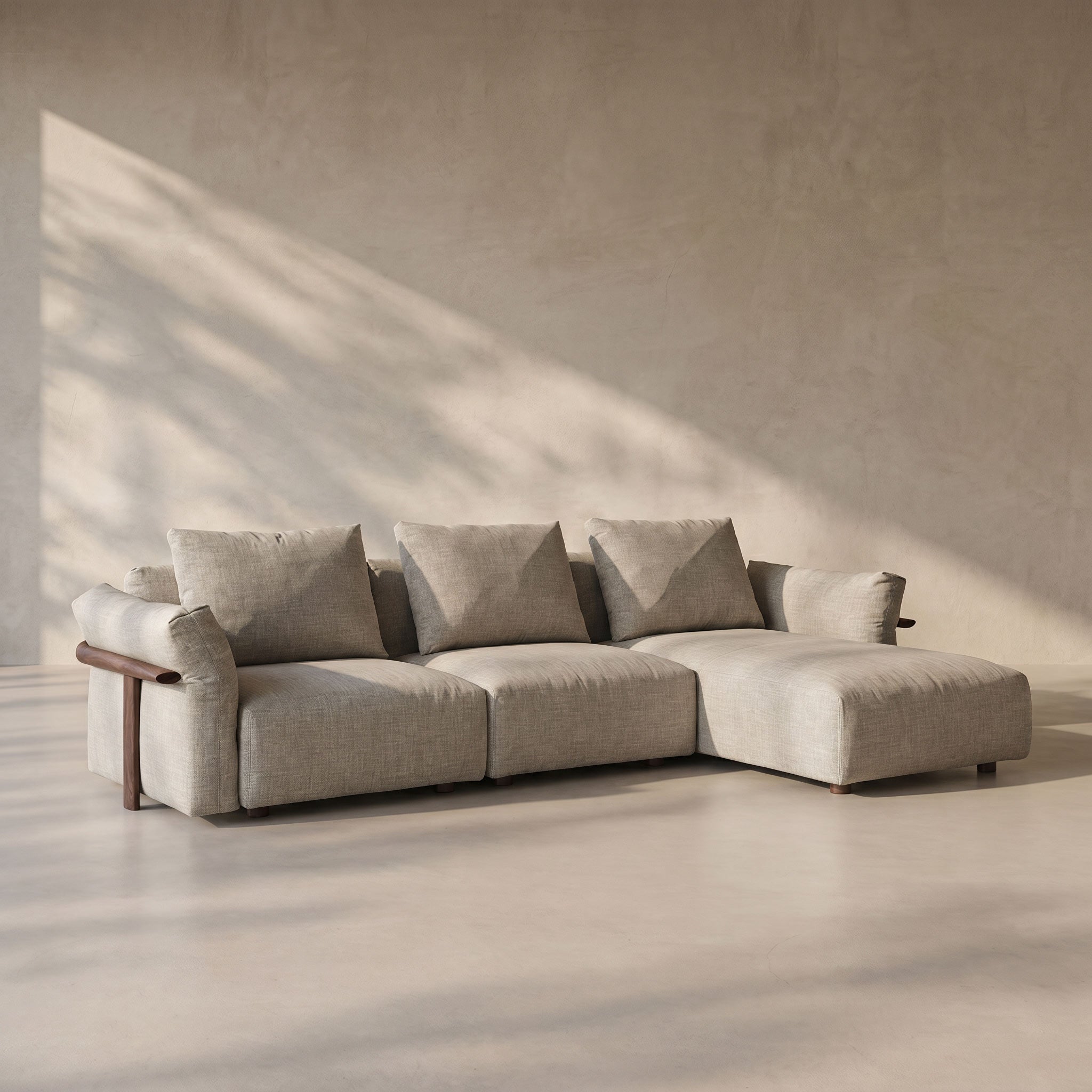 Gray sectional sofa in a minimalistic room with soft lighting