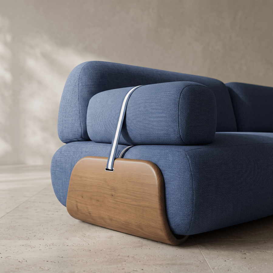 A modern blue upholstered sofa with a curved wooden side panel and a thin white stripe detail, photographed in a minimalist interior setting.