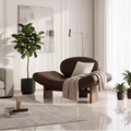 A modern brown leather lounge chair with a curved back and wooden legs, styled in a bright, contemporary living room with a beige sofa, potted plants, and a light gray rug.